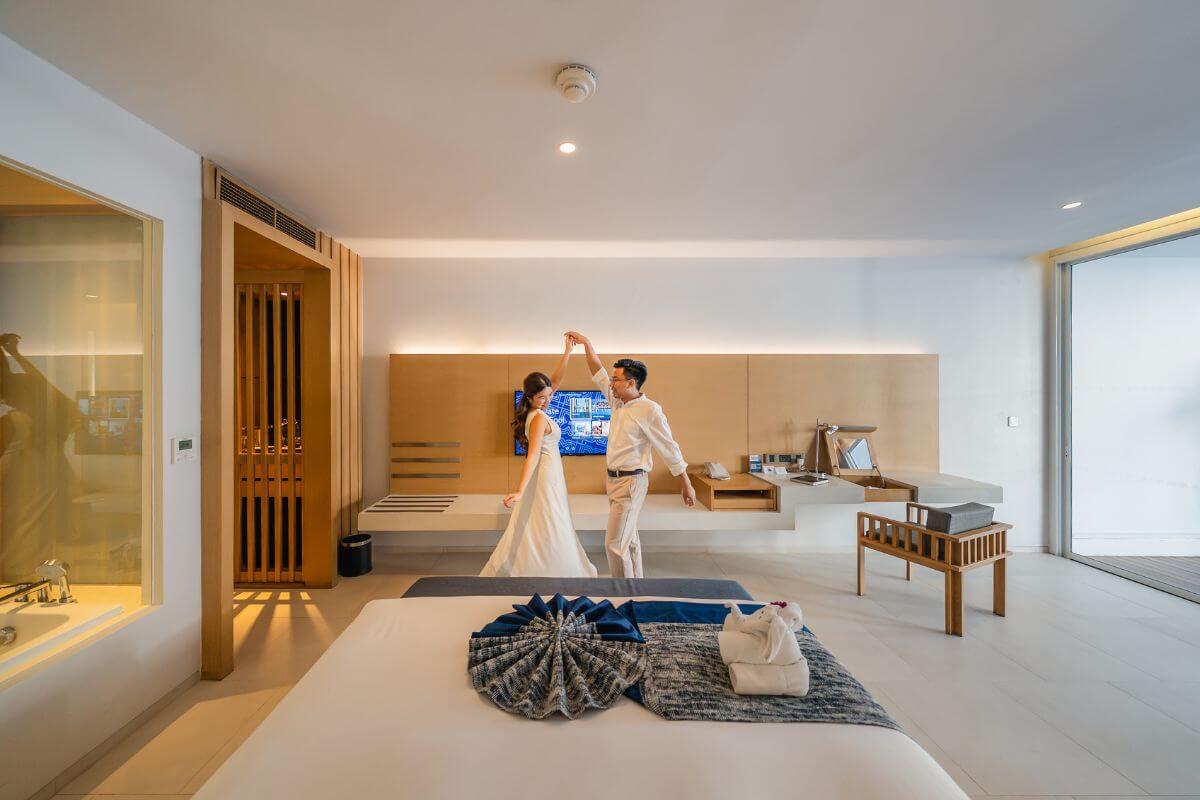 Couple enjoying a hotel suite